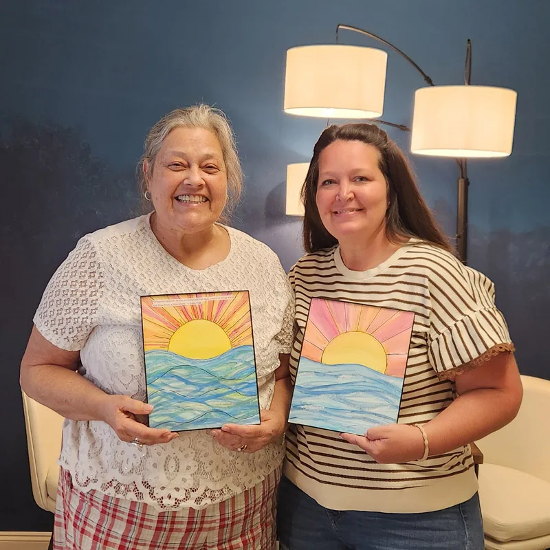 Two attendees at Rooted Grace Studios workshop